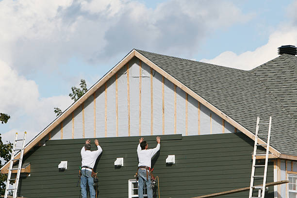 Professional Siding Contractor technician working in Prince George, VA